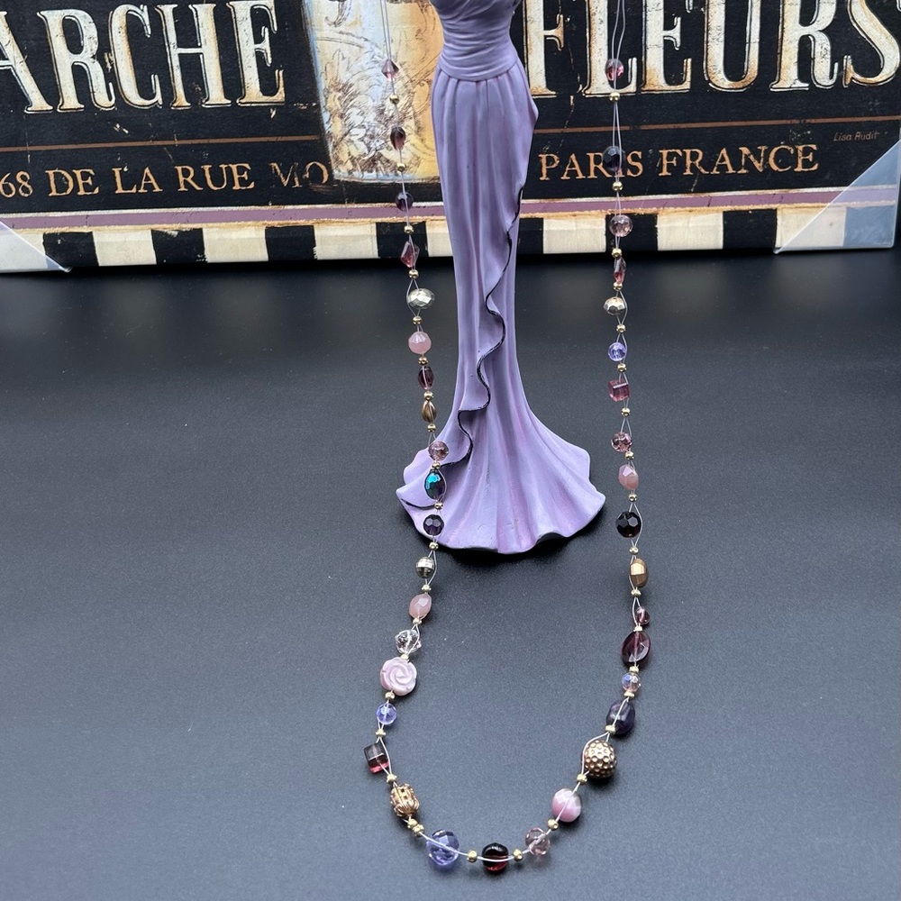 Gorgeous multiple purple, pink, yellow tones, glass beads size 20 inches long.